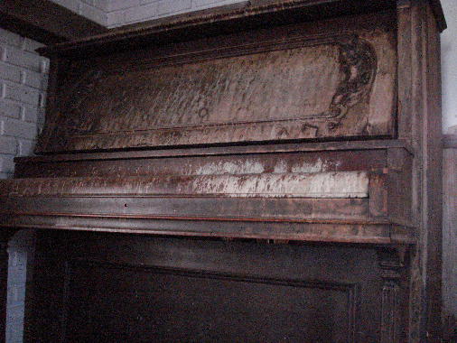 1 - Damaged by fire--front view 1 - Damaged by fire--front view